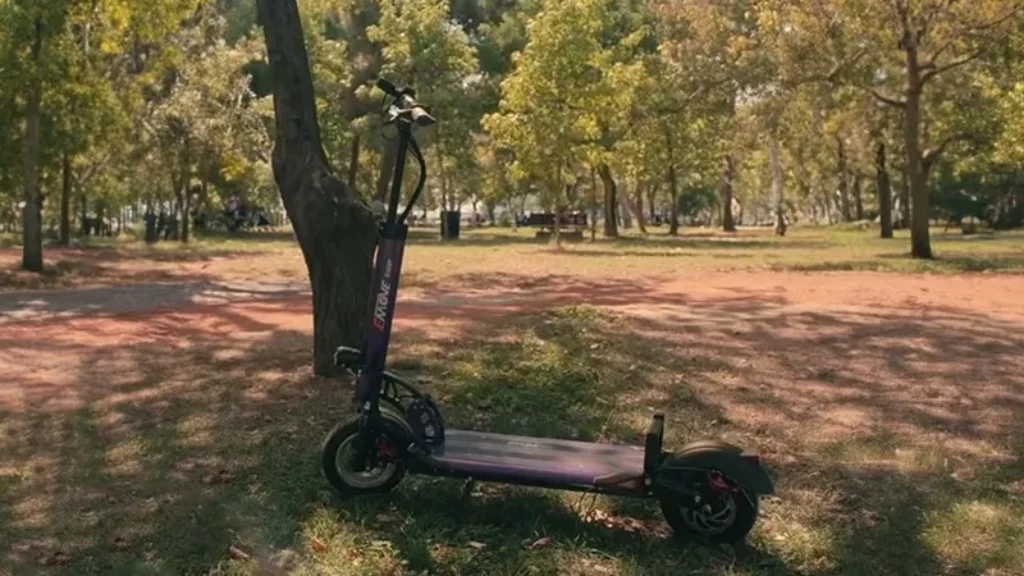 The Emove Cruiser S long range scooter in action riding in the park