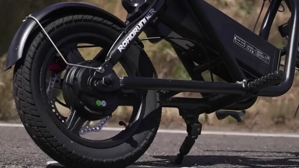 Close up on the swappable battery, rear tire, and motor of the Roadrunner v2
