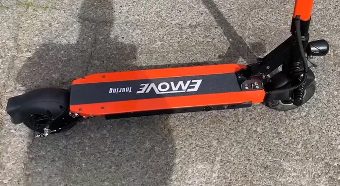 Emove touring shot from above showing spacious deck, folding mechanism, suspension and tires