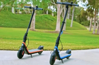 Kids electric scooter Segway C2 pro standing on the pavement in a park clear view