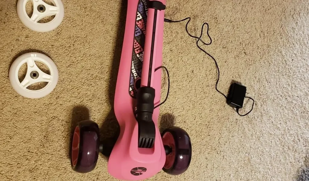Double wheel setup, charger, and scooter itself. Everything in the box t500 elecorange